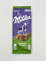 Милка (плитки)  дроблен.фундук/елка 80/ 100 гр  20/24 шт.