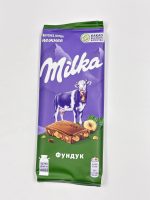 Милка (плитки)  дроблен.фундук/елка 80/ 100 гр  20/24 шт. — изображение 2